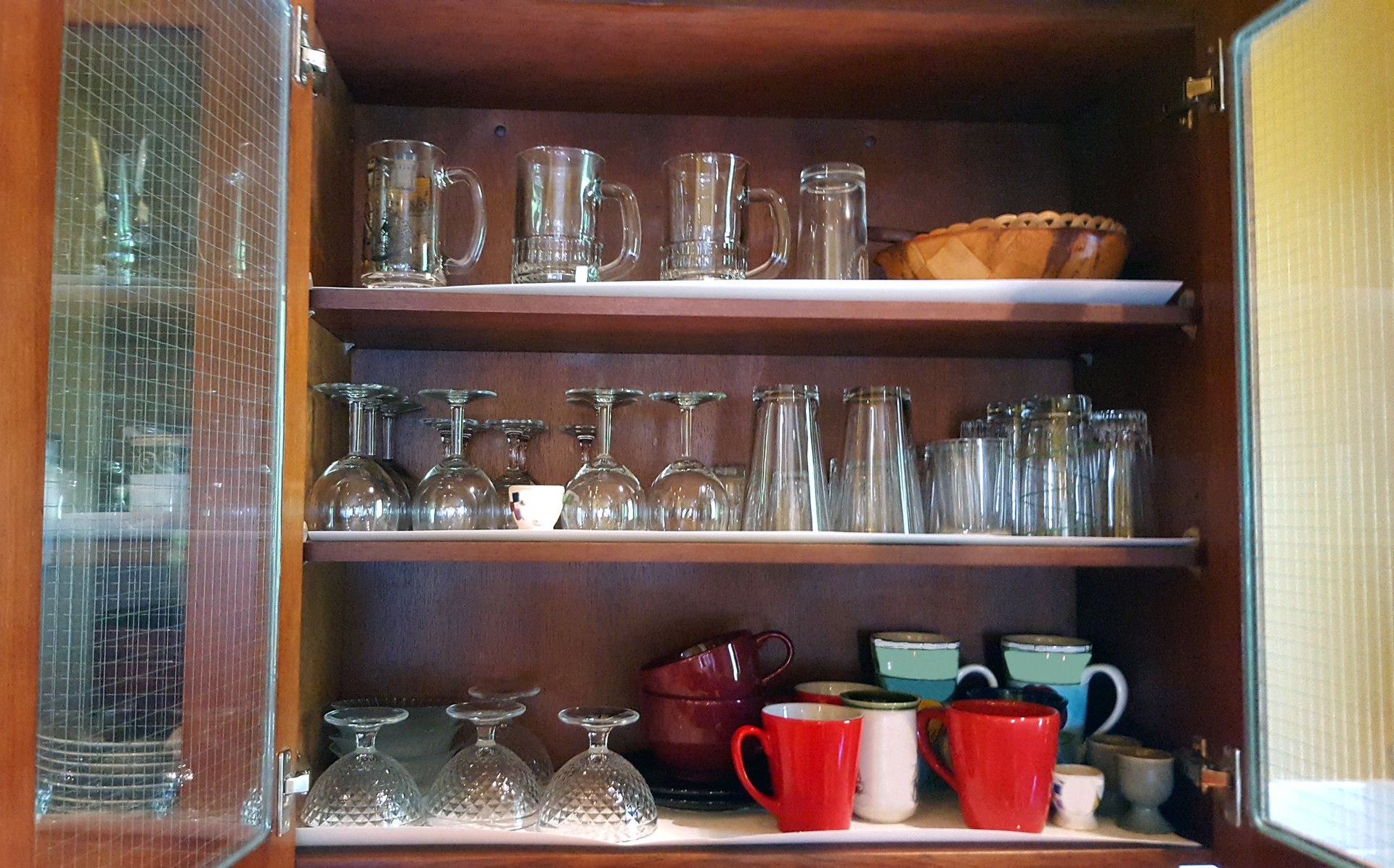 Well Stocked Kitchen Cupboard Of Glassware